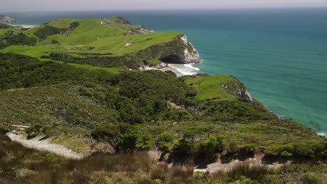 Female-photographer-taking-photos-of-Cape-Farewell