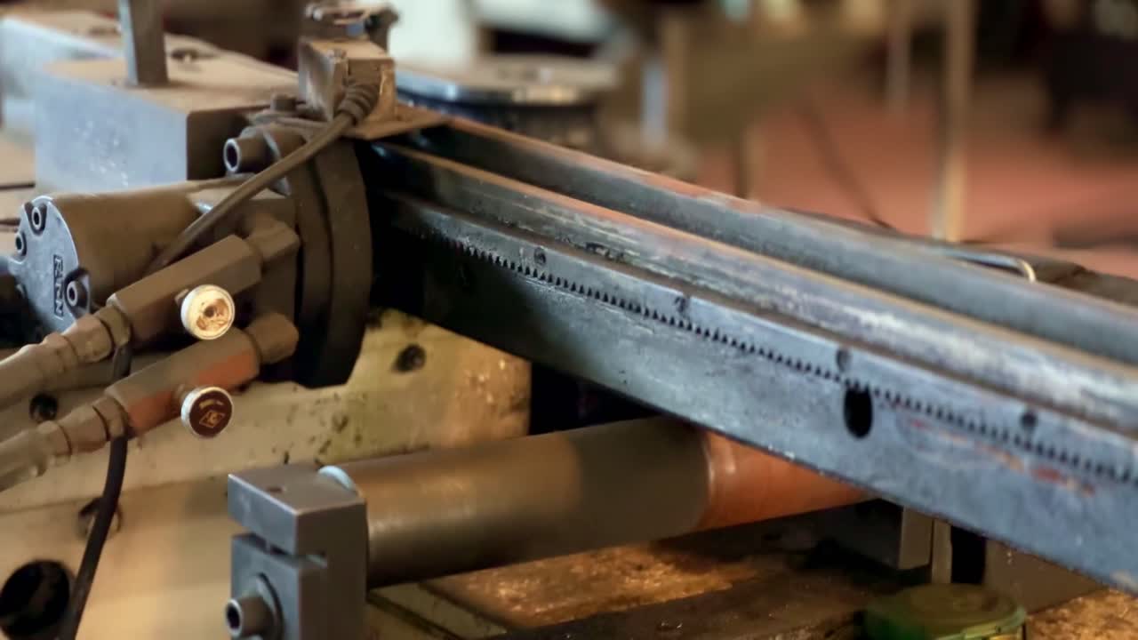 Serrated iron part of old dirty machine