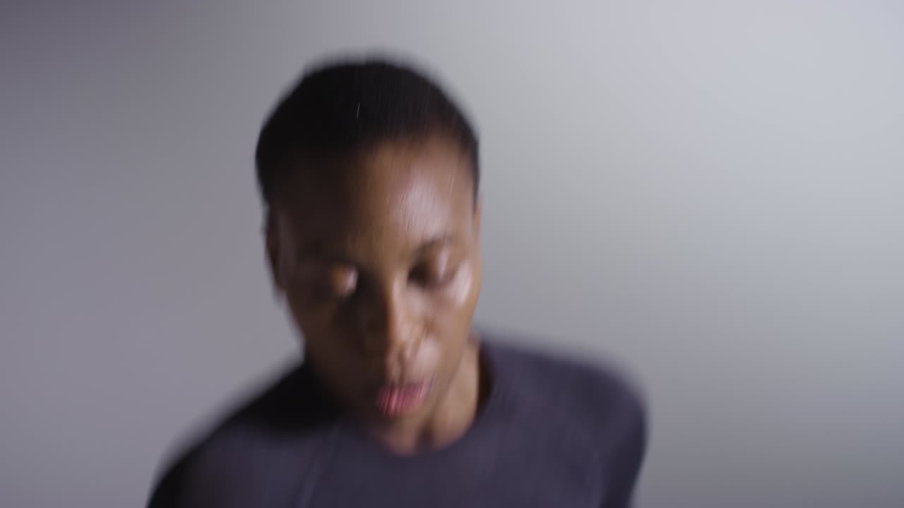 Studio Shot Of Woman Wearing Gym Fitness Clothing Exercising Running On The Spot 5