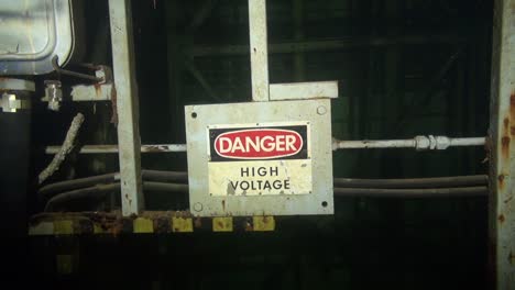 high voltage sign in flooded nuclear silo