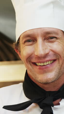 chef showing tray of croissants