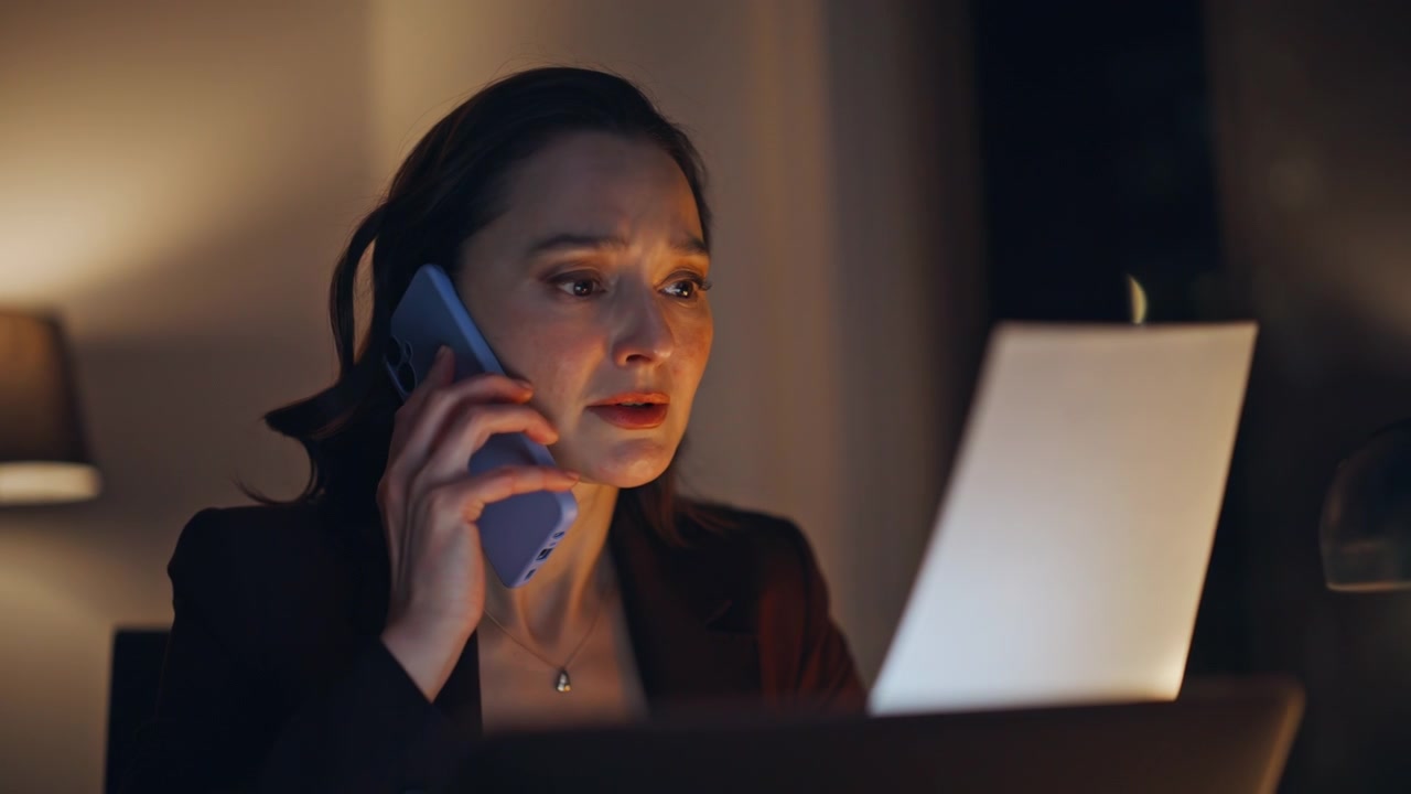 Worried specialist calling mobile phone discussing business agreement at office