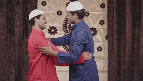 muslim man congratulating his friend