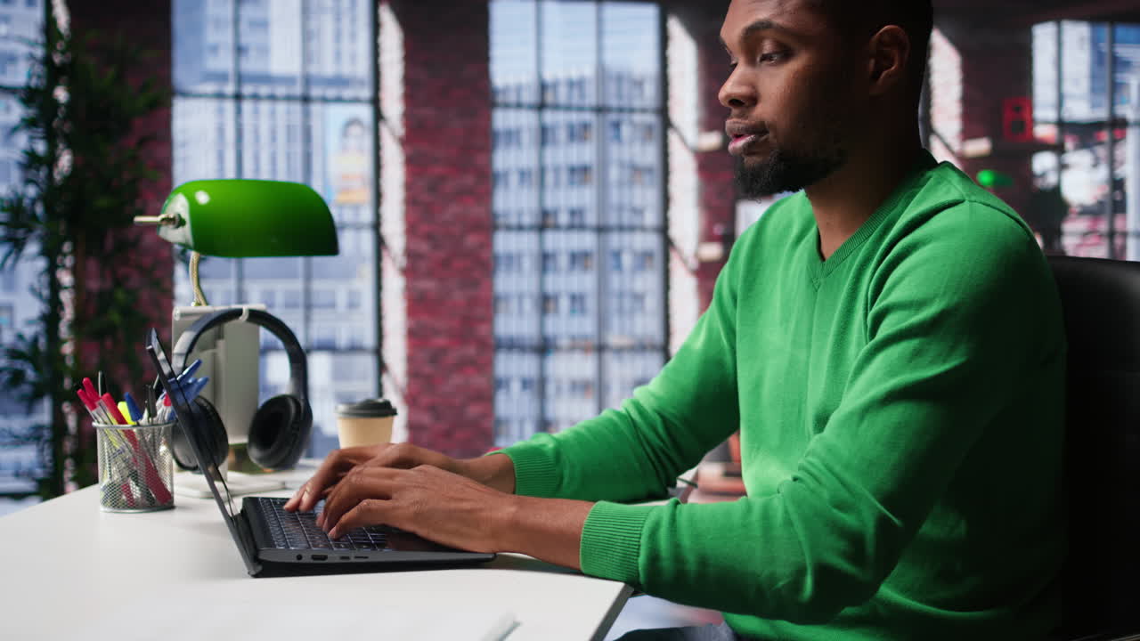 Vertical Video Man feeling exhausted and in pain from lack of sleep at home desk
