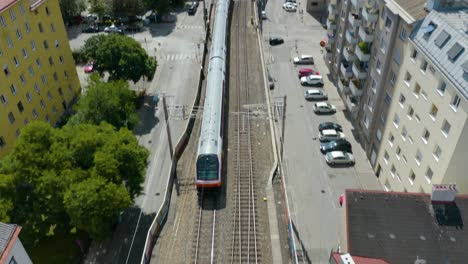 fixed aerial shot of subway train in vienna, austria, europe