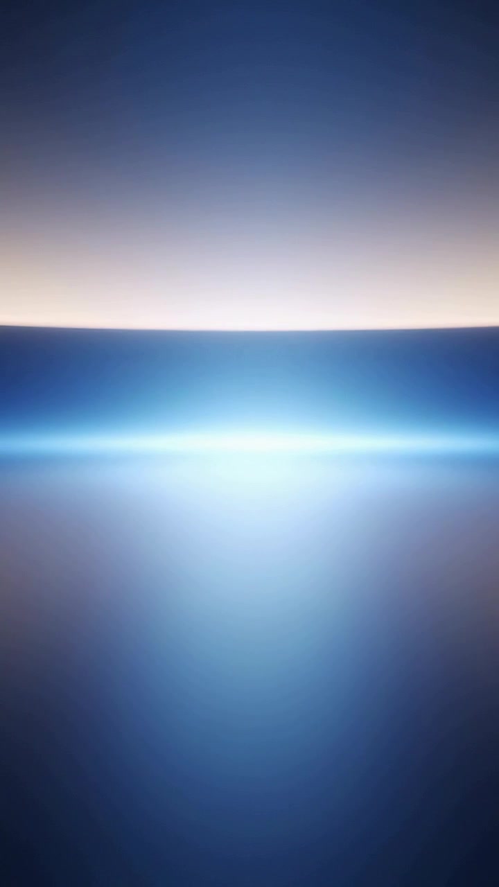 Video verticale: Riproduzione che inizia con una banda di luce brillante che pulsa sullo schermo con dissolvenza blu, creando atmosfera.