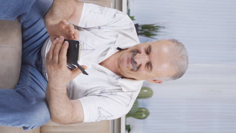 Vertical-video-of-The-old-man-who-reads-the-good-news.