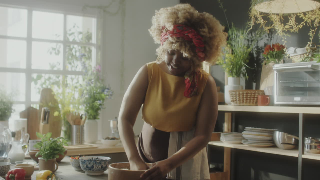 Food Blogger Kneading Dough and Talking on Camera