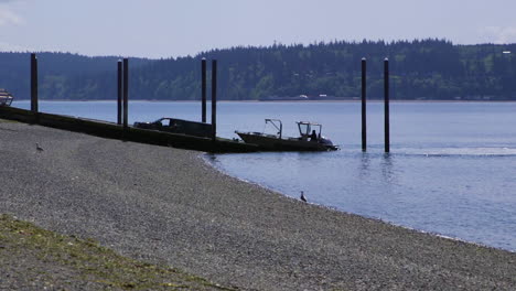 small, nondescript fishing loading onto trailer from public boat launch ramp at camano island state park, wa state 15sec-24fps slow motion