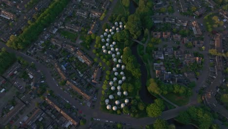 Top down view of famous Bolwoningen at &#039;s-Hertogenbosch with sunset, aerial