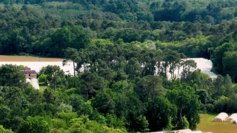 A-small-high-speed-helicopter-sprays-a-fungicide-against-insects-in-a-strawberry-plantation-near-Monpazier-in-the-Dordogne