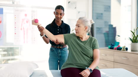 Woman,-physiotherapist-and-patient-with-dumbbell