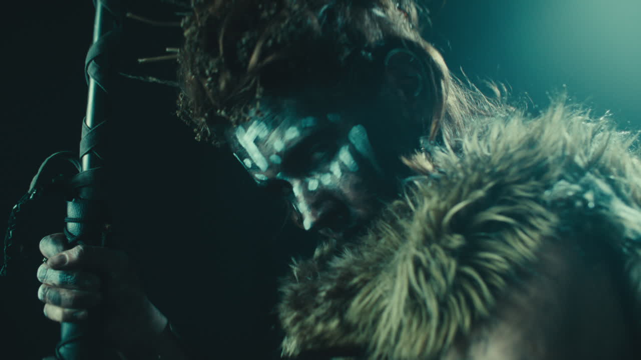 A creepy witch rises her head during the night storm