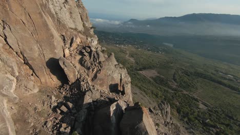 aerial view of mountainous landscape with cliffs and landslide