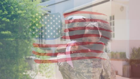 Animation-Der-Flagge-Der-USA,-Die-über-Einem-Weinenden-Afroamerikanischen-Soldaten-Und-Seiner-Tochter-Weht
