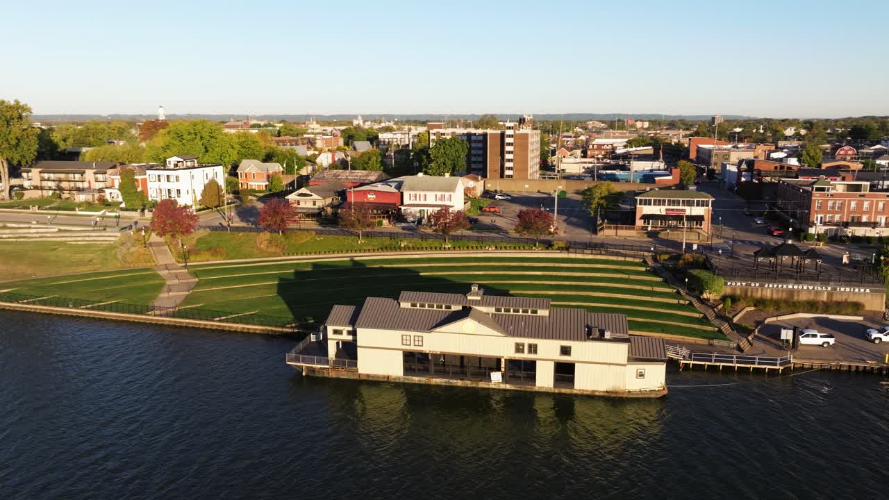 Orbiting Drone Shot Above Riverstage Park at Sunrise. Ohio River. Jeffersonville, Indiana