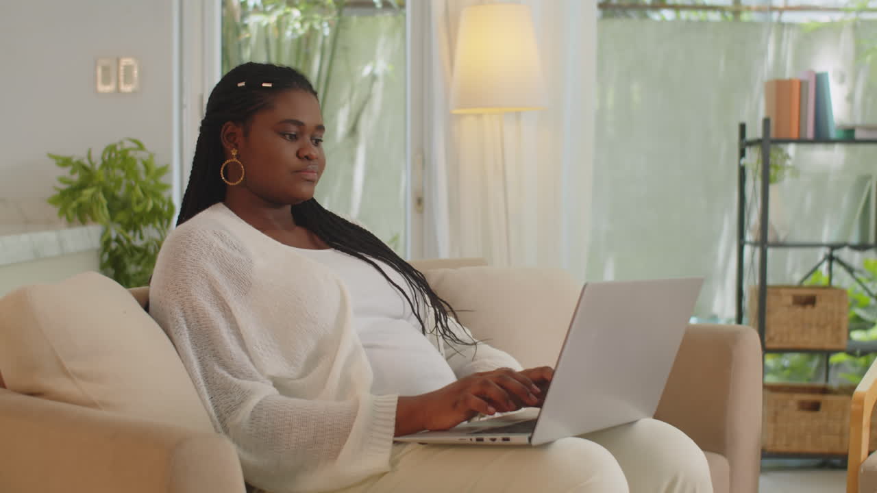 Woman using a laptop indoors