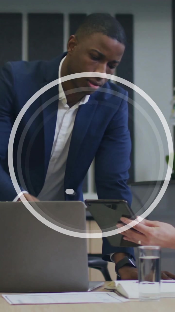 Animation of email icon and data processing over diverse business people in office