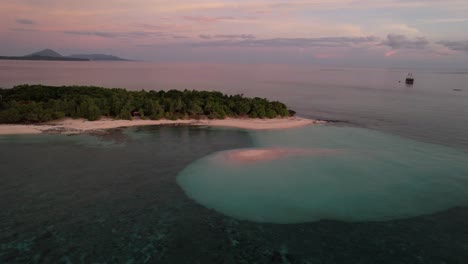 beautiful view of tropical island during sunset in banda sea