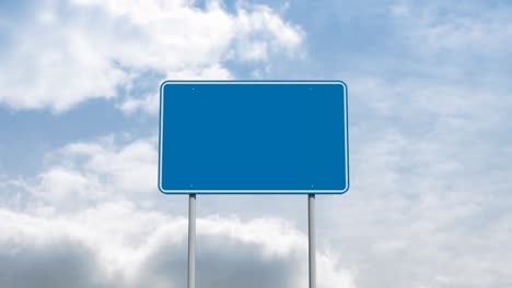 Animation-of-road-sign-and-clouds-on-blue-background