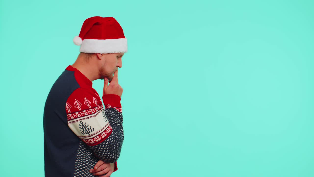 赤いクリスマスセーターを着た男性指を上げるジェスチャークリエイティブなプランを思いついた - ライブドアニュース