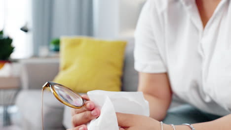 Black-woman-cleaning-glasses