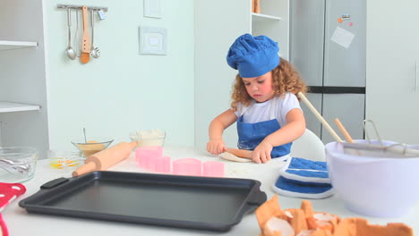 adorable little girl baking