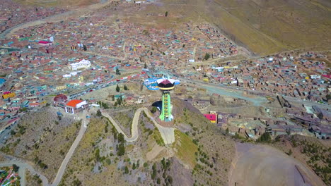 aerial view of the pari-orcko tower and the potosi, bolivia cityscape