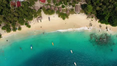 Aerial-view-of-beautiful-water-and-simple-houses-on-Asu-Island,-North-Sumatra,-Indonesia