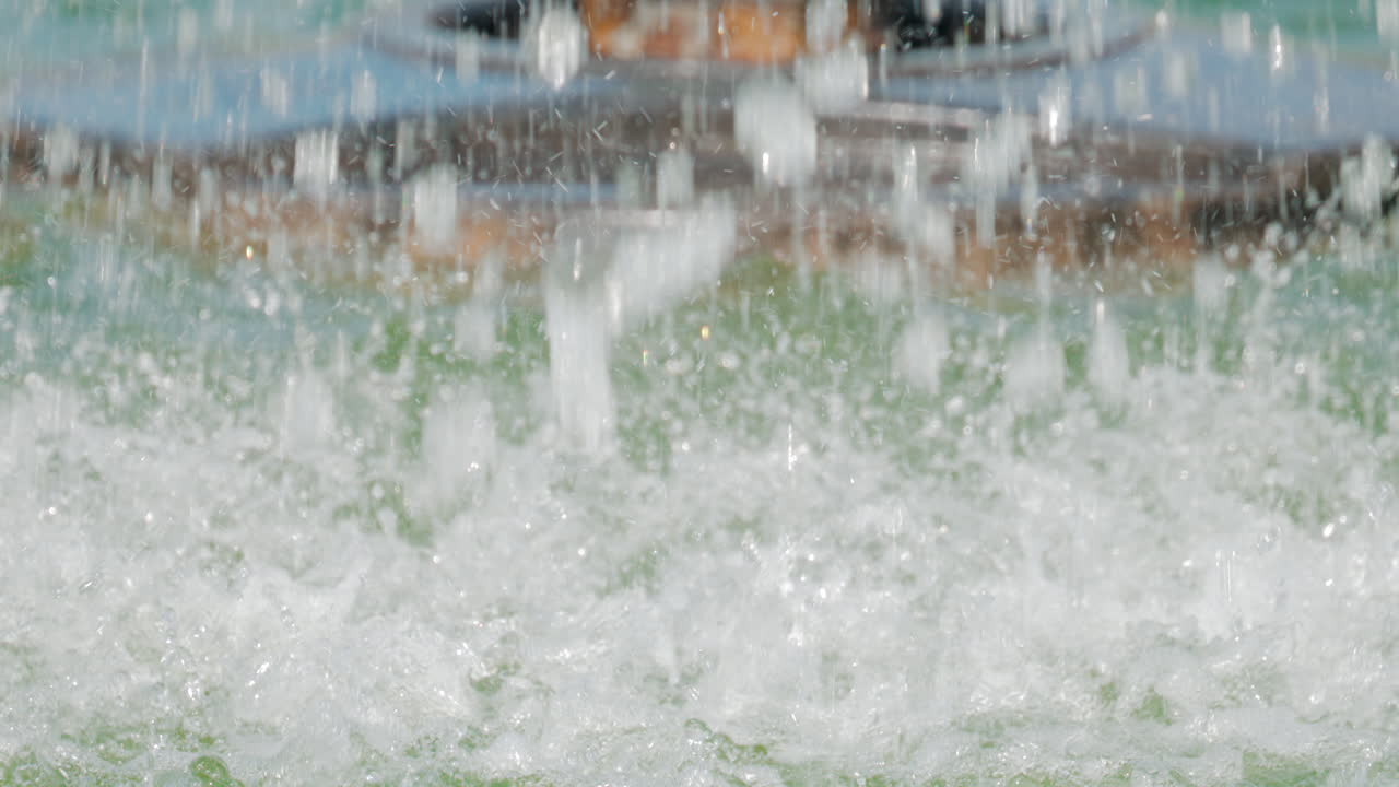 Close up of splashing water droplets in motion