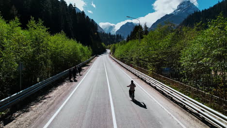 Mountain Road with Cyclist and Hikers