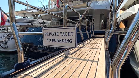 private yacht with no boarding sign