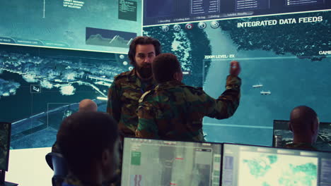 un equipo diverso de oficiales del ejército revisando información importante de las líneas enemigas