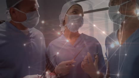 Animation-of-network-of-connections-over-surgeons-in-operating-theatre