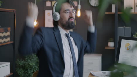 businessman dancing in office