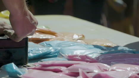 Packs-Of-Colored-Powder-On-The-Table-During-Holi-Festival-In-Poland