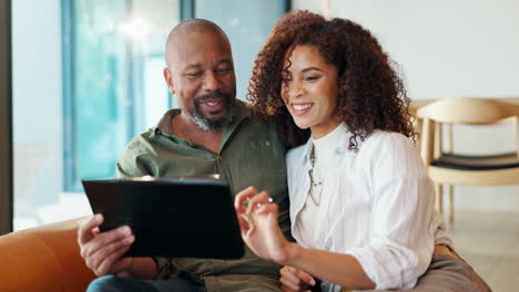 a loving couple enjoying time together with a tablet