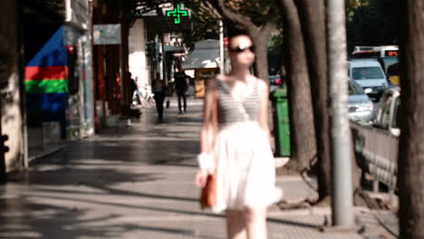 young woman in sunglasses