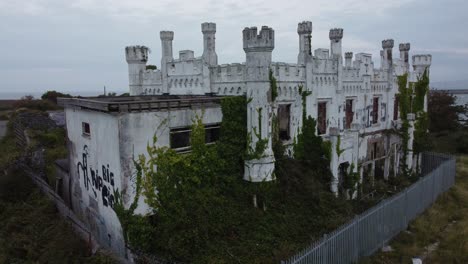 soldiers point house aerial view rising over abandoned coastal holyhead victorian castle mansion