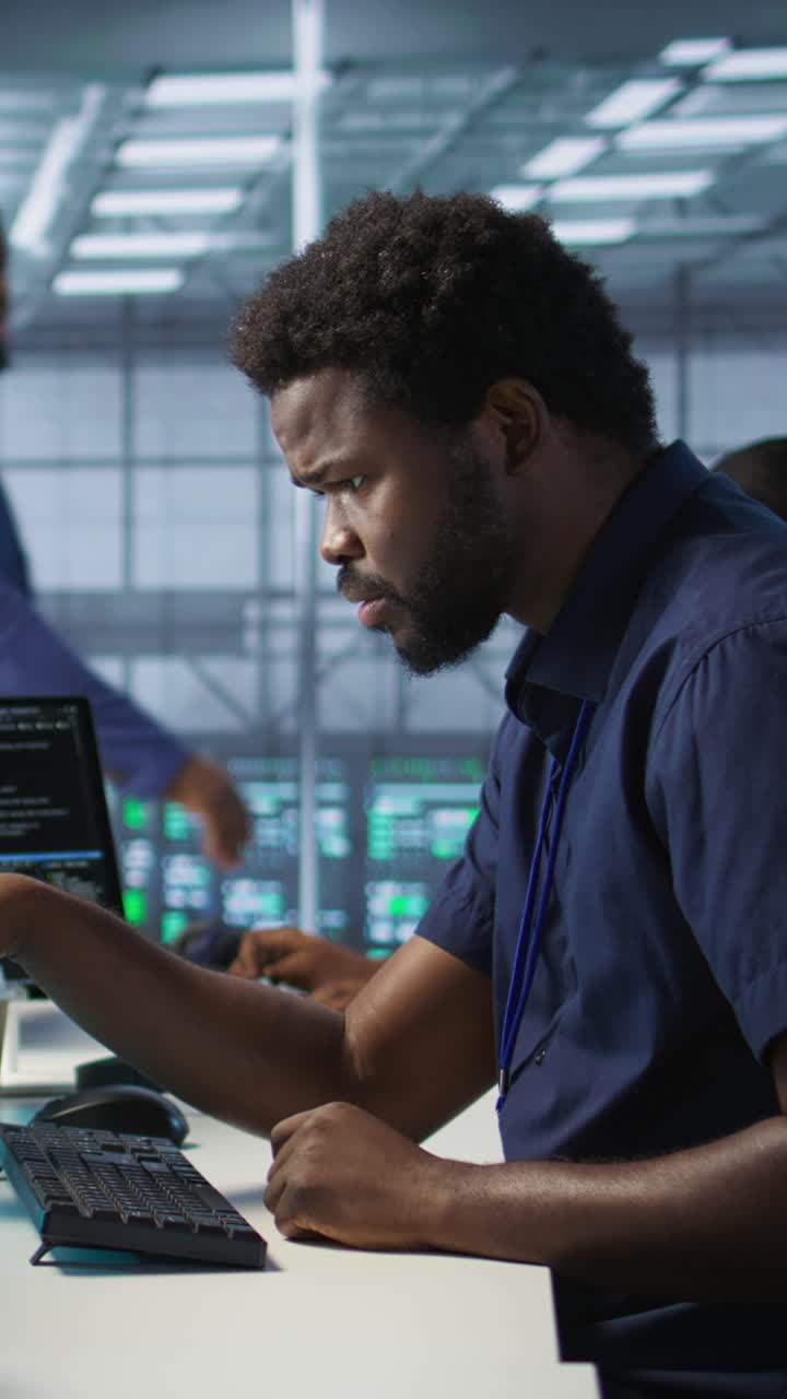 Vertical video Engineer in data center implementing advanced AI systems