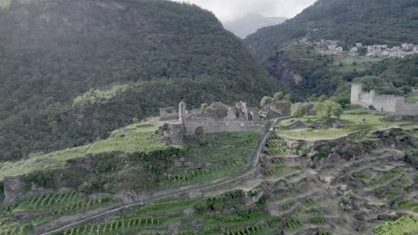 video with drone of orbital plane and spiral over the catillo nuovo or vistonceo with horizon to the town of ravoledo