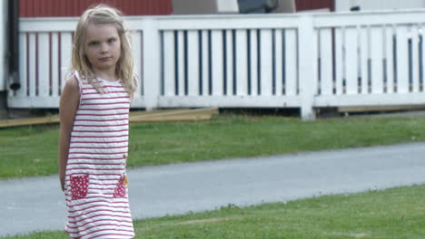 scandinavian youth, blond girl in dress during summertime, medium