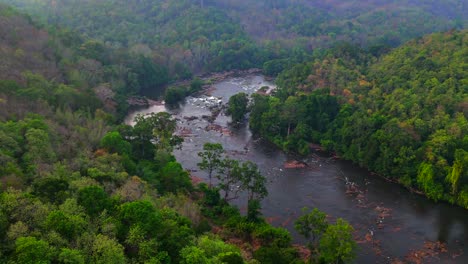 morning view of chalakudy river in thrissur, kerala, indiabig rock middle stream at run dry