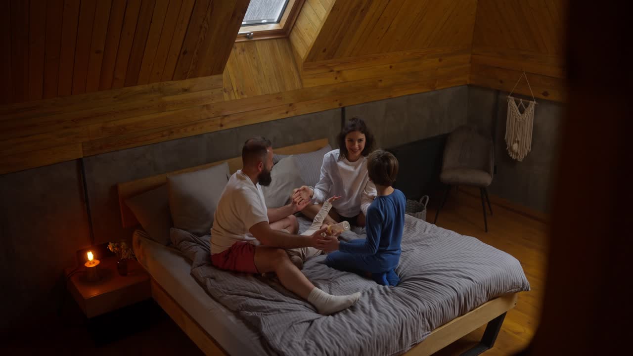 Family moment in the attic bedroom