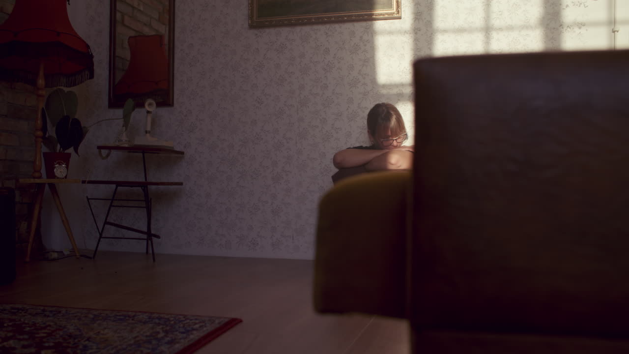 Woman Sitting Alone on the Floor