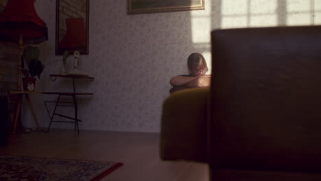 woman sitting alone on the floor