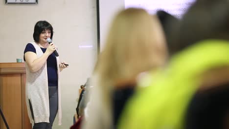 public speaker giving talk at business event. vinnitsa, ukraine, april 2017: speaker at business conference and presentation. audience at the conference hall.