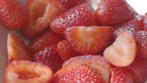 fresh ripe strawberries, whole and sliced