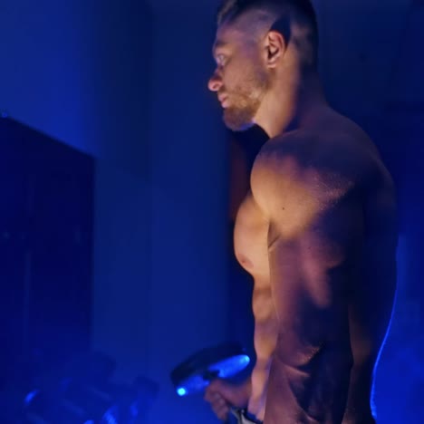 young man using exercise at gym