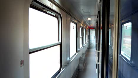 empty corridor in the train cabin while traveling in 4k slow motion 60fps